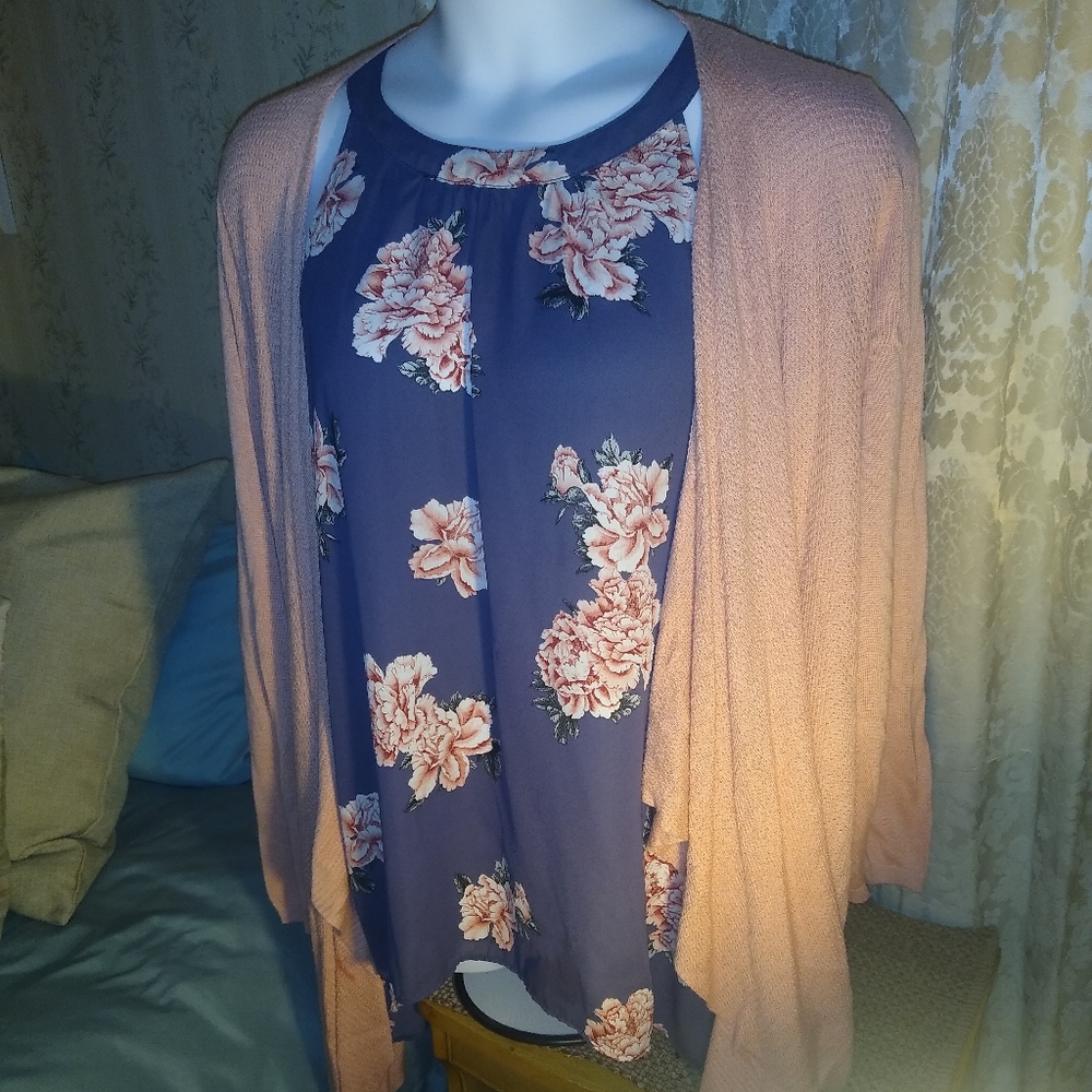 Sweater and sleeveless blouse